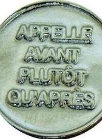 Verso du jeton du nouveau en nickel avec le texte "Appelle avant plutôt qu'après".